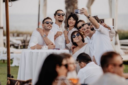 White Dress beach party at Savoy Beach Club Paestum for a destination wedding.