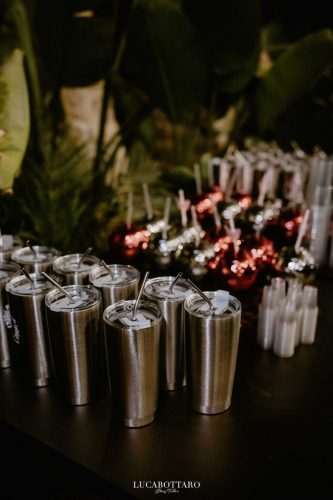 Cake cutting ceremony at Castello di Rocca Cilento with panoramic night view.